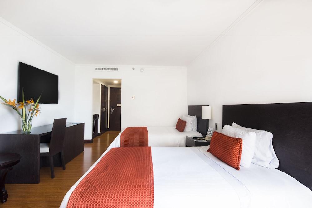Hotel Dann Carlton Belfort Medellín Eksteriør bilde A room at the hotel